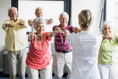 Seniors doing exercises