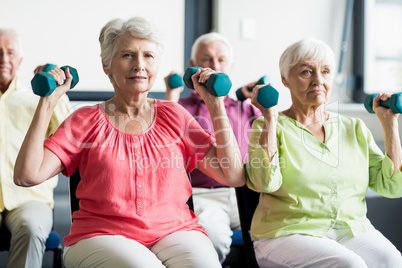 Seniors using weights