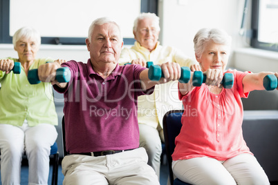 Seniors using weights