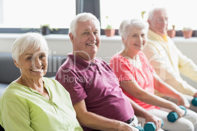 Seniors using weights