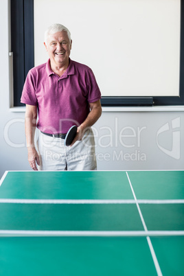 Senior playing ping-pong