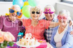 Seniors wearing funny glasses