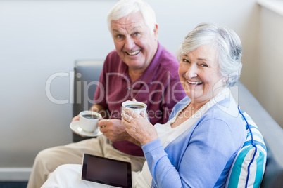 Senior couple drinking coffee