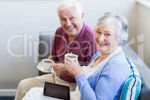 Senior couple drinking coffee