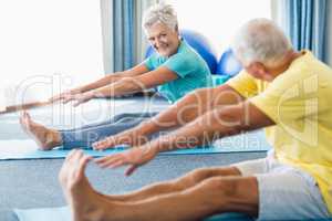 Seniors stretching legs