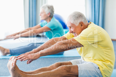 Seniors stretching legs