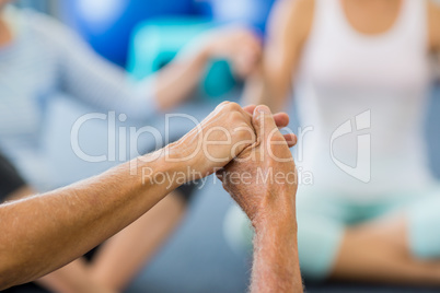 Seniors performing yoga