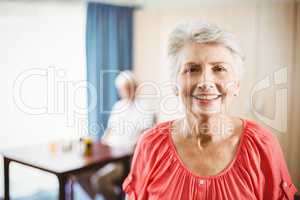 Senior woman looking at camera