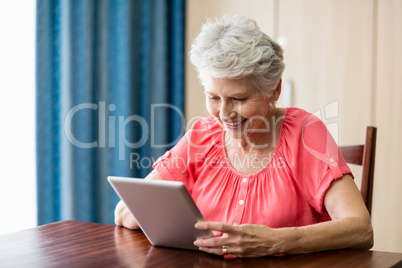 Senior woman using a tablet