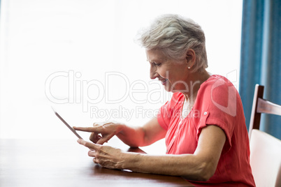 Senior woman using a tablet