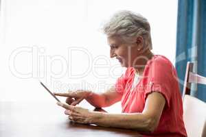 Senior woman using a tablet