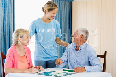 Senior couple playing board games