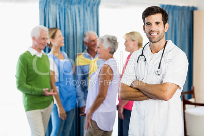 Nurse standing with arms crossed