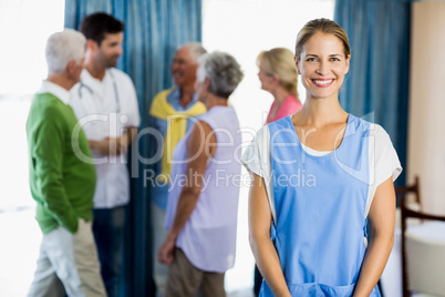 Nurse standing in front of seniors