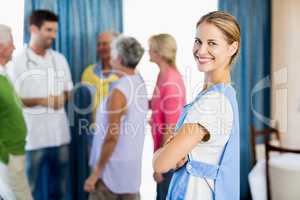 Nurse standing with arms crossed