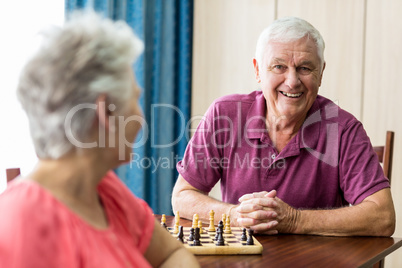 Senior couple playing chess