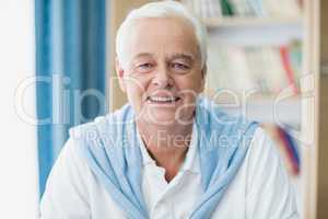 Senior man smiling at camera
