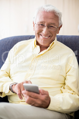 Senior using a smartphone Senior using a smartphone