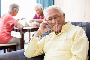 Senior sitting on a couch