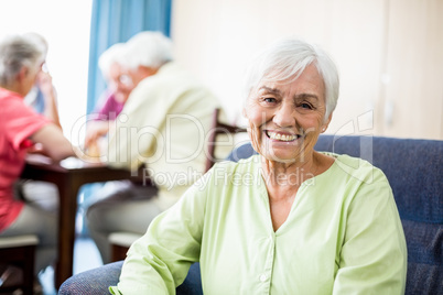 Senior woman sitting on a couch