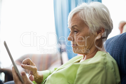 Senior woman using a tablet