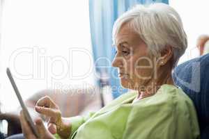 Senior woman using a tablet