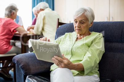 Senior woman using a tablet