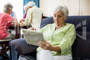 Senior woman using a tablet