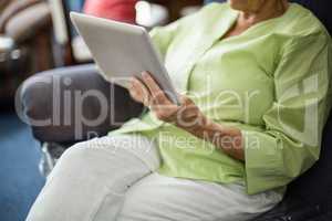 Senior woman using a tablet