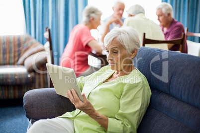 Senior woman using a tablet