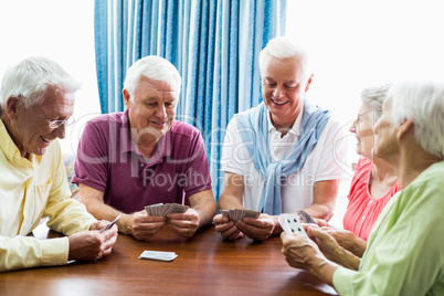 Seniors playing cards together