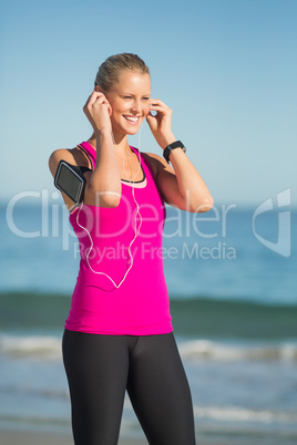 Woman listening music on headphone