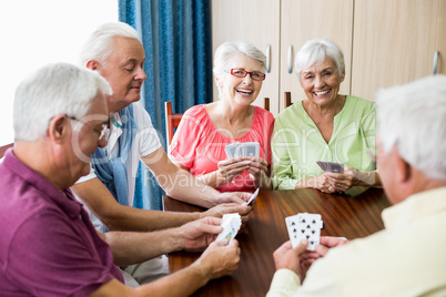 Seniors playing cards together