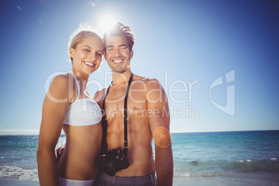 Couple embracing each other on beach