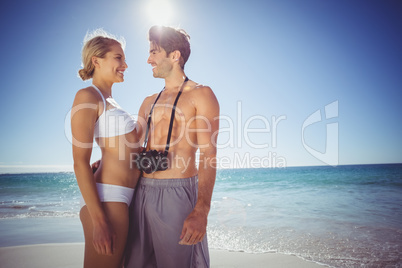 Couple embracing each other on beach
