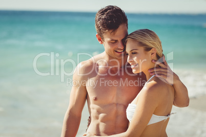 Couple romancing on beach
