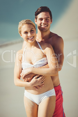 Couple embracing each other on beach