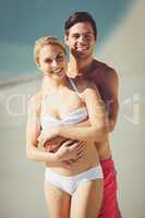 Couple embracing each other on beach