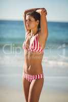 Beautiful woman posing on beach