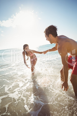 Couple playing in water