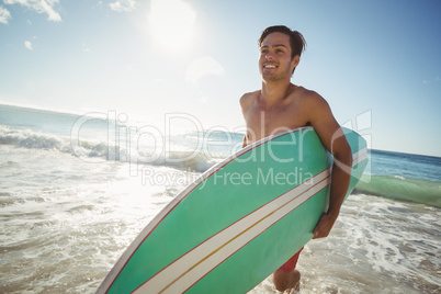 Man running on beach alone