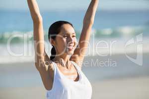 Woman standing with arms outstretched