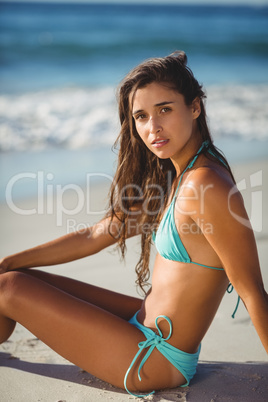 Young woman posing on beach