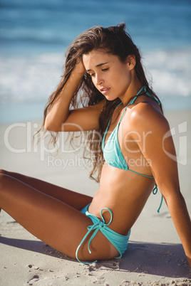 Young woman posing on beach