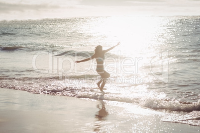 Woman playing in water