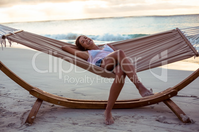 Woman relaxing on a hammock