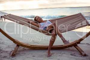 Woman relaxing on a hammock