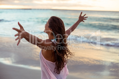 Woman stretching out her arms