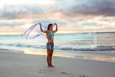 Woman holding a scarf