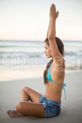 Young woman performing yoga